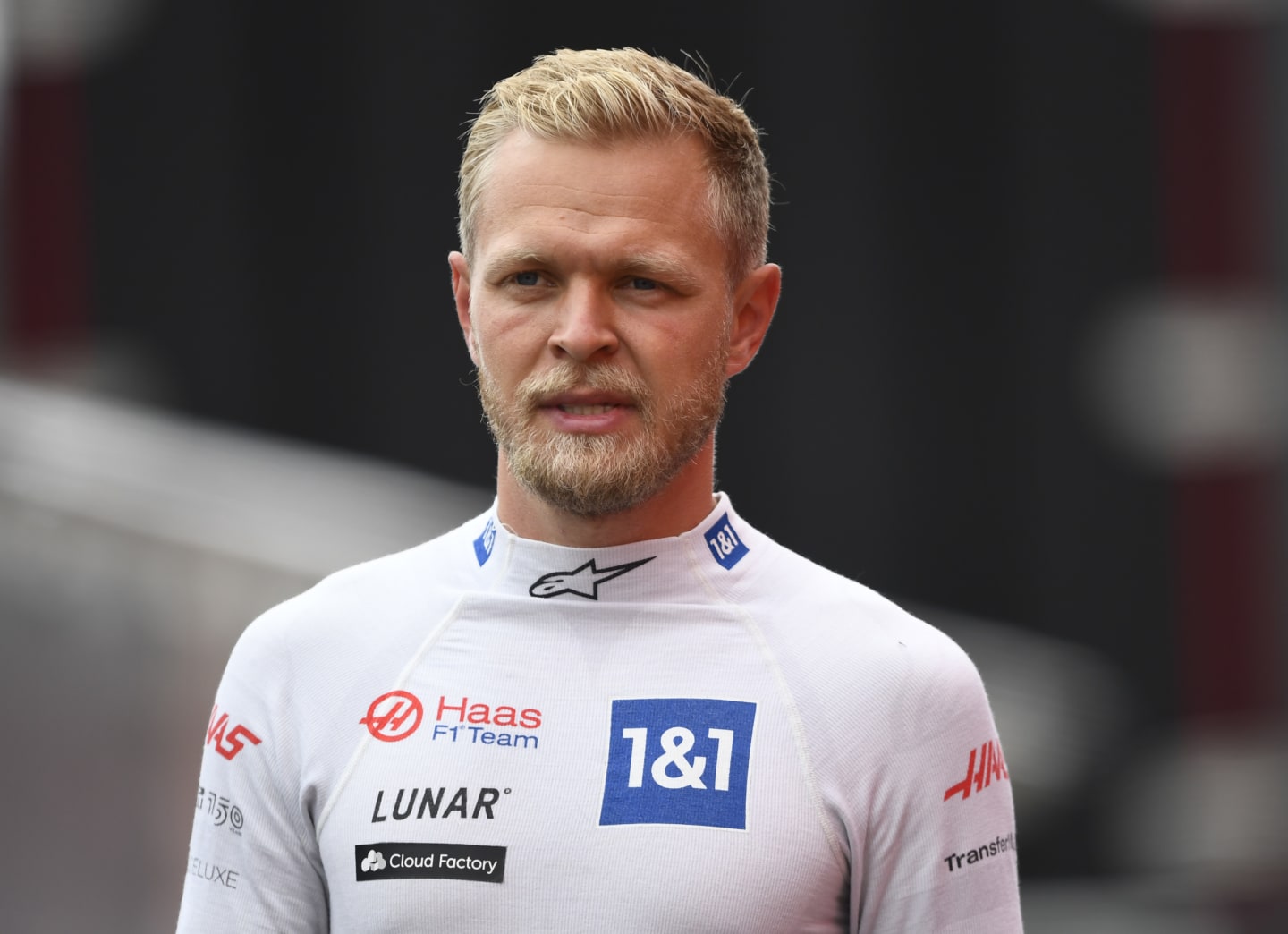 SPA, BELGIUM - AUGUST 27: 18th place qualifier Kevin Magnussen of Denmark and Haas F1 walks in the Pitlane during qualifying ahead of the F1 Grand Prix of Belgium at Circuit de Spa-Francorchamps on August 27, 2022 in Spa, Belgium. (Photo by Rudy Carezzevoli/Getty Images)