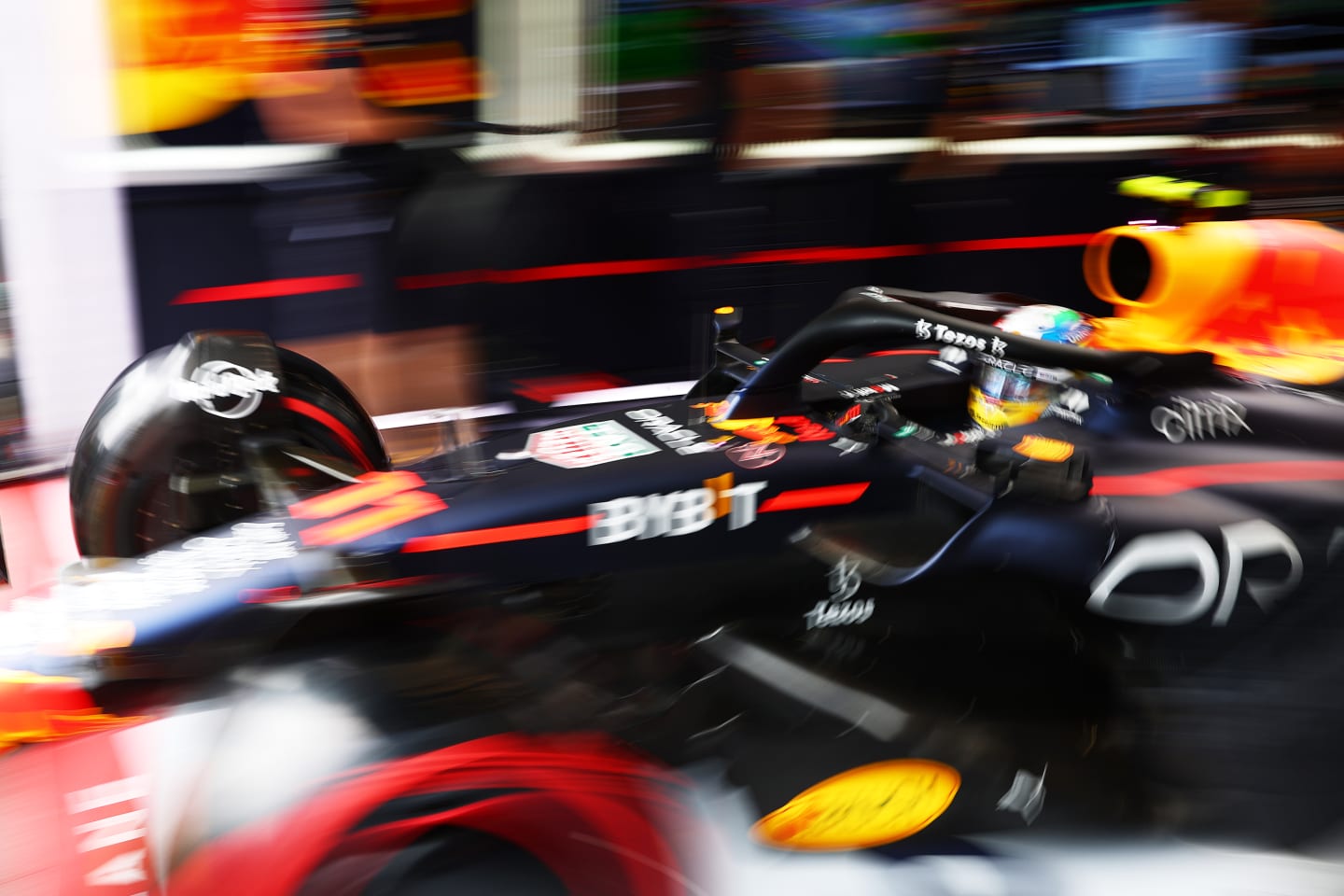 SPA, BELGIUM - AUGUST 27: Sergio Perez of Mexico driving the (11) Oracle Red Bull Racing RB18 leaves the garage during qualifying ahead of the F1 Grand Prix of Belgium at Circuit de Spa-Francorchamps on August 27, 2022 in Spa, Belgium. (Photo by Mark Thompson/Getty Images)