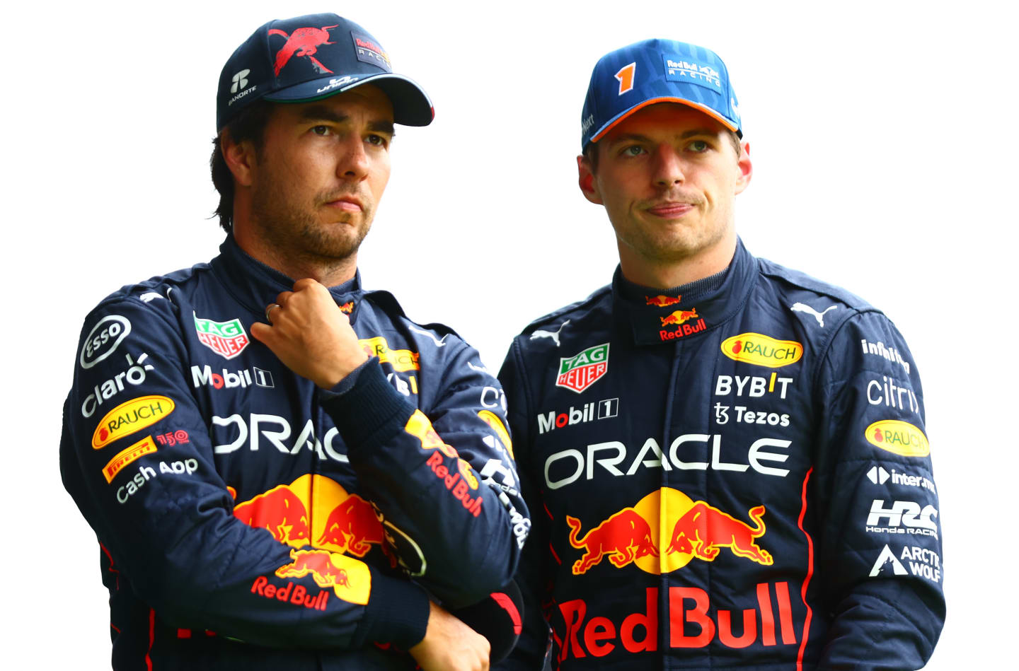 SPA, BELGIUM - AUGUST 27: Pole position qualifier Max Verstappen of the Netherlands and Oracle Red Bull Racing and Third placed qualifier Sergio Perez of Mexico and Oracle Red Bull Racing talk in parc ferme during qualifying ahead of the F1 Grand Prix of Belgium at Circuit de Spa-Francorchamps on August 27, 2022 in Spa, Belgium. (Photo by Dan Istitene - Formula 1/Formula 1 via Getty Images)