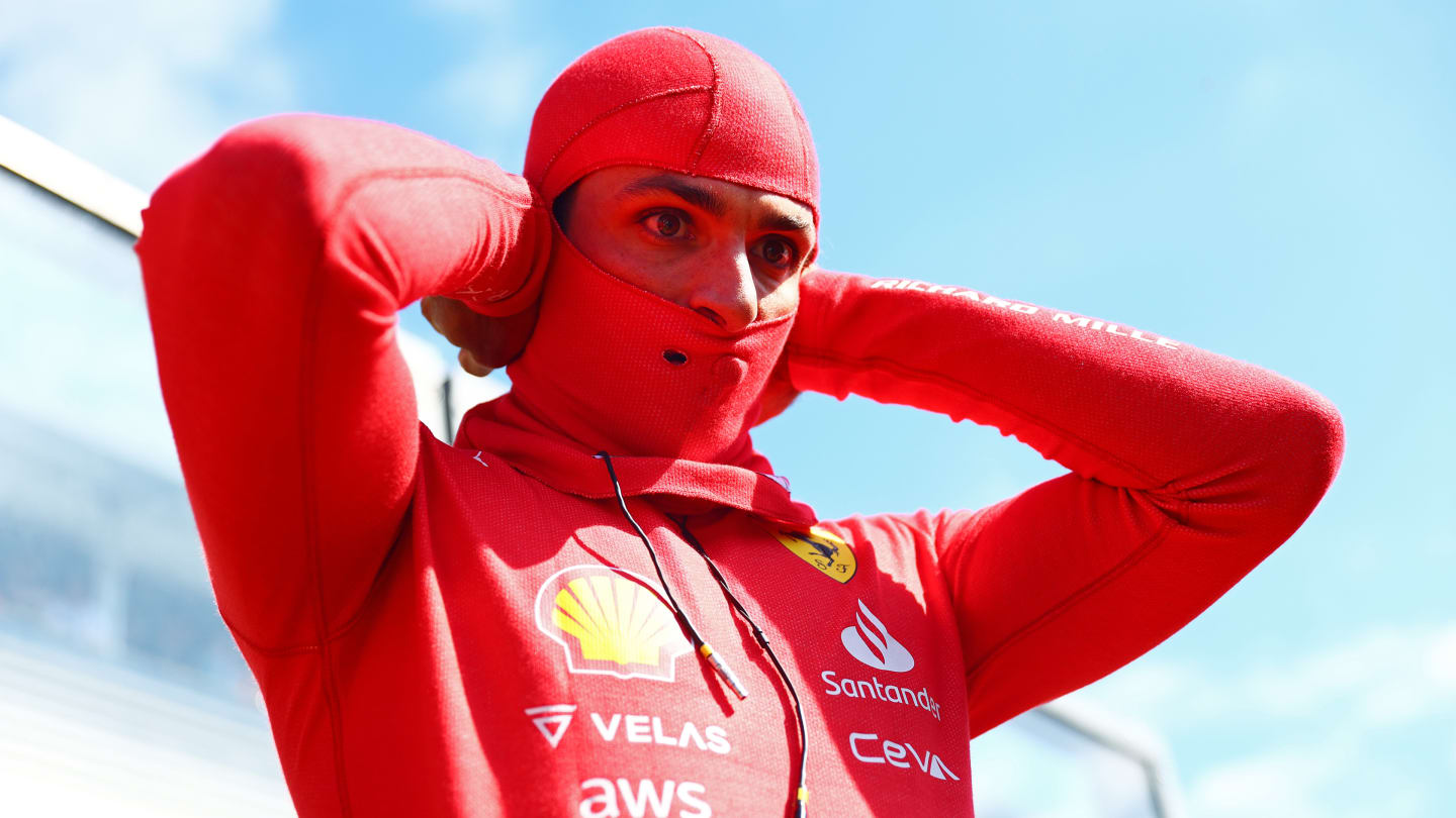 SPA, BELGIUM - AUGUST 28: Carlos Sainz of Spain and Ferrari prepares to drive on the grid during