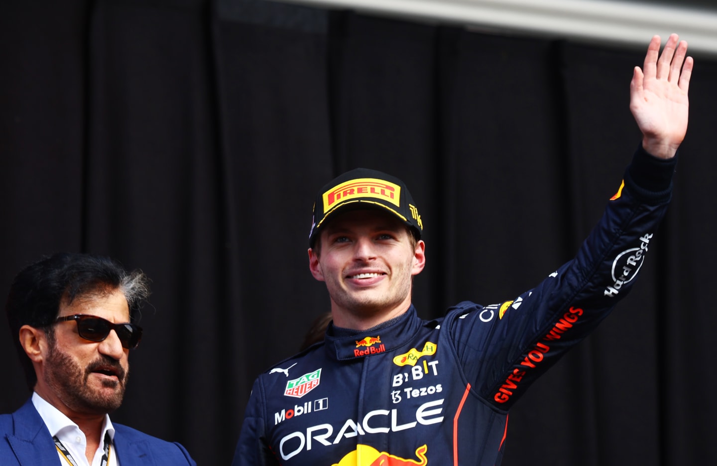 SPA, BELGIUM - AUGUST 28:  Race winner Max Verstappen of the Netherlands and Oracle Red Bull Racing celebrates on the podium during the F1 Grand Prix of Belgium at Circuit de Spa-Francorchamps on August 28, 2022 in Spa, Belgium. (Photo by Mark Thompson/Getty Images)