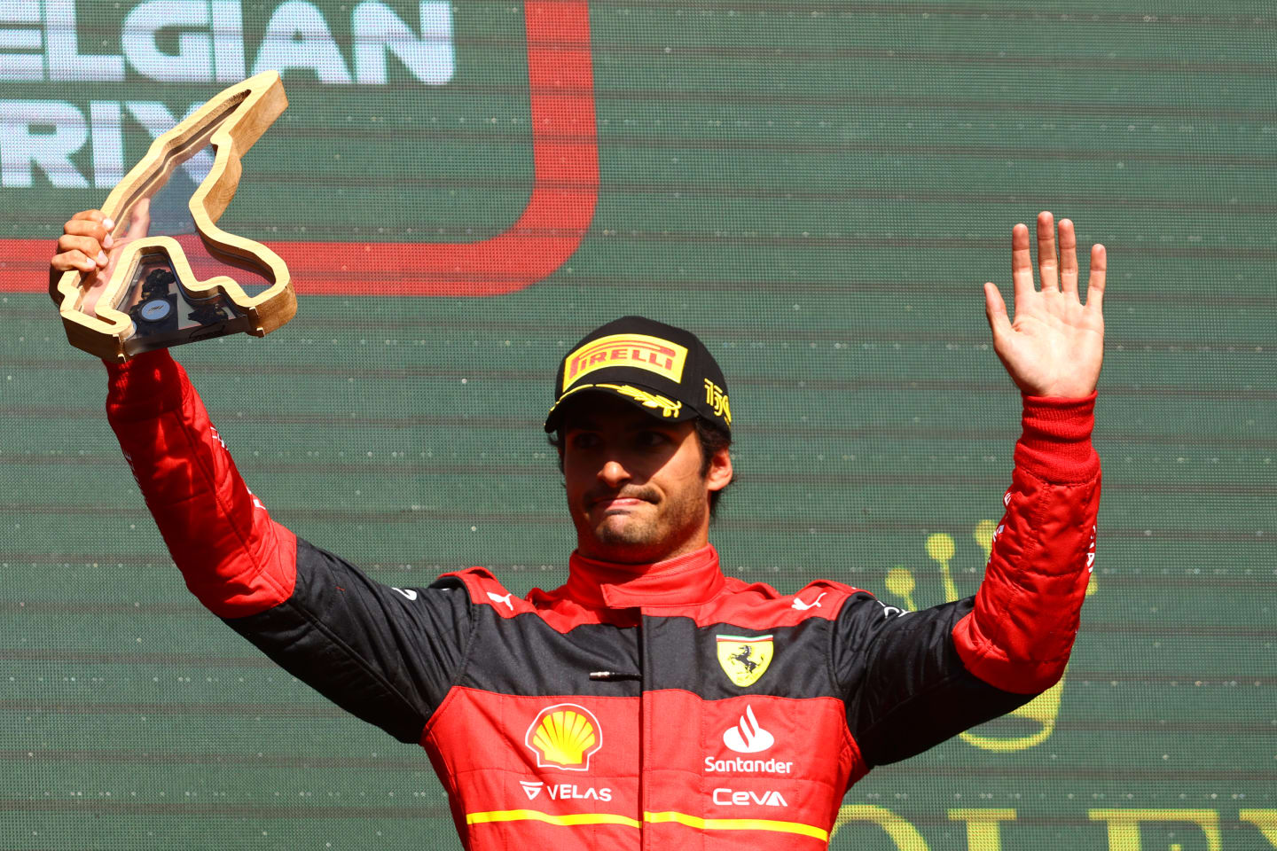 SPA, BELGIUM - AUGUST 28: Third placed Carlos Sainz of Spain and Ferrari celebrates on the podium during the F1 Grand Prix of Belgium at Circuit de Spa-Francorchamps on August 28, 2022 in Spa, Belgium. (Photo by Mark Thompson/Getty Images)