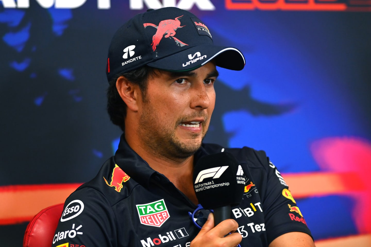 SPA, BELGIUM - AUGUST 25: Sergio Perez of Mexico and Oracle Red Bull Racing talks in the Drivers Press Conference during previews ahead of the F1 Grand Prix of Belgium at Circuit de Spa-Francorchamps on August 25, 2022 in Spa, Belgium. (Photo by Dan Mullan/Getty Images)