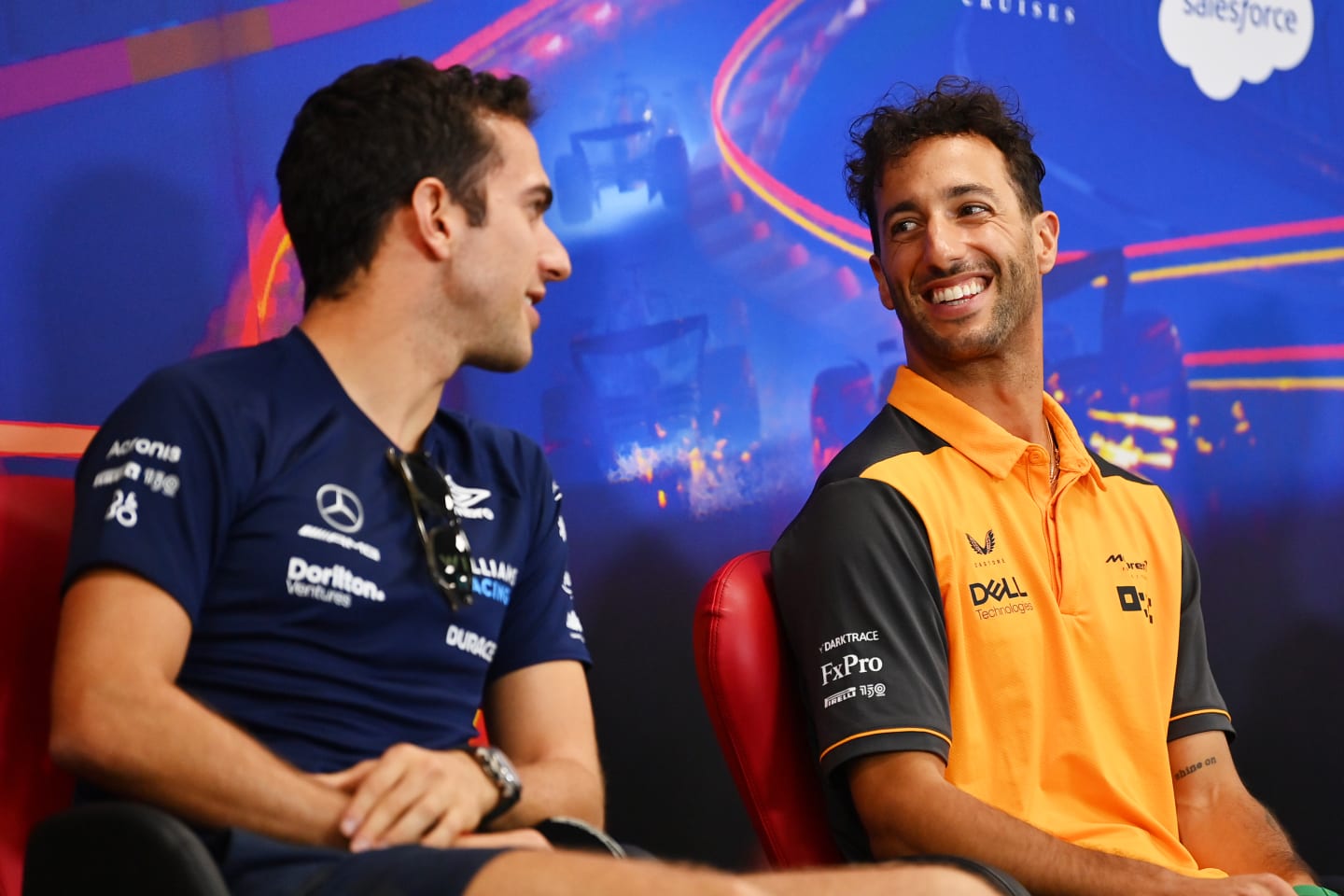 SPA, BELGIUM - AUGUST 25: Nicholas Latifi of Canada and Williams and Daniel Ricciardo of Australia and McLaren talk in the Drivers Press Conference during previews ahead of the F1 Grand Prix of Belgium at Circuit de Spa-Francorchamps on August 25, 2022 in Spa, Belgium. (Photo by Dan Mullan/Getty Images)