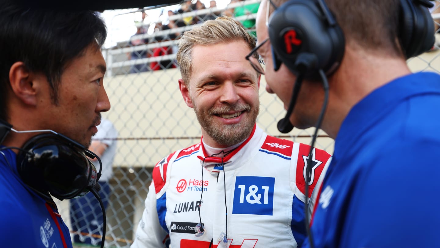 SAO PAULO, BRAZIL - NOVEMBER 12: Kevin Magnussen of Denmark and Haas F1 talks with his engineers on