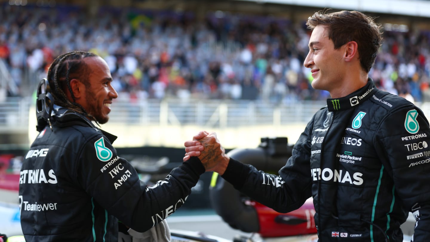 SAO PAULO, BRAZIL - NOVEMBER 12: Sprint winner George Russell of Great Britain and Mercedes and Third placed Lewis Hamilton of Great Britain and Mercedes celebrate in parc ferme during the Sprint ahead of the F1 Grand Prix of Brazil at Autodromo Jose Carlos Pace on November 12, 2022 in Sao Paulo, Brazil. (Photo by Dan Istitene - Formula 1/Formula 1 via Getty Images)