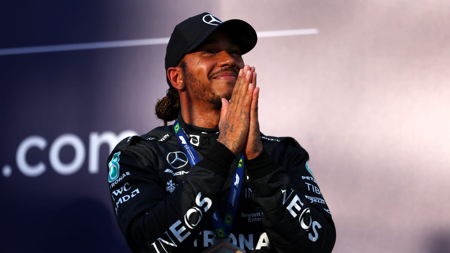 SAO PAULO, BRAZIL - NOVEMBER 12: Third placed Lewis Hamilton of Great Britain and Mercedes celebrates in parc ferme during the Sprint ahead of the F1 Grand Prix of Brazil at Autodromo Jose Carlos Pace on November 12, 2022 in Sao Paulo, Brazil. (Photo by Bryn Lennon - Formula 1/Formula 1 via Getty Images)