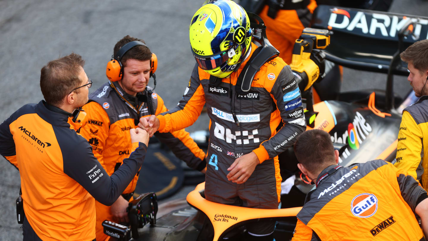 SAO PAULO, BRAZIL - NOVEMBER 12: Lando Norris of Great Britain and McLaren bumps fists with McLaren