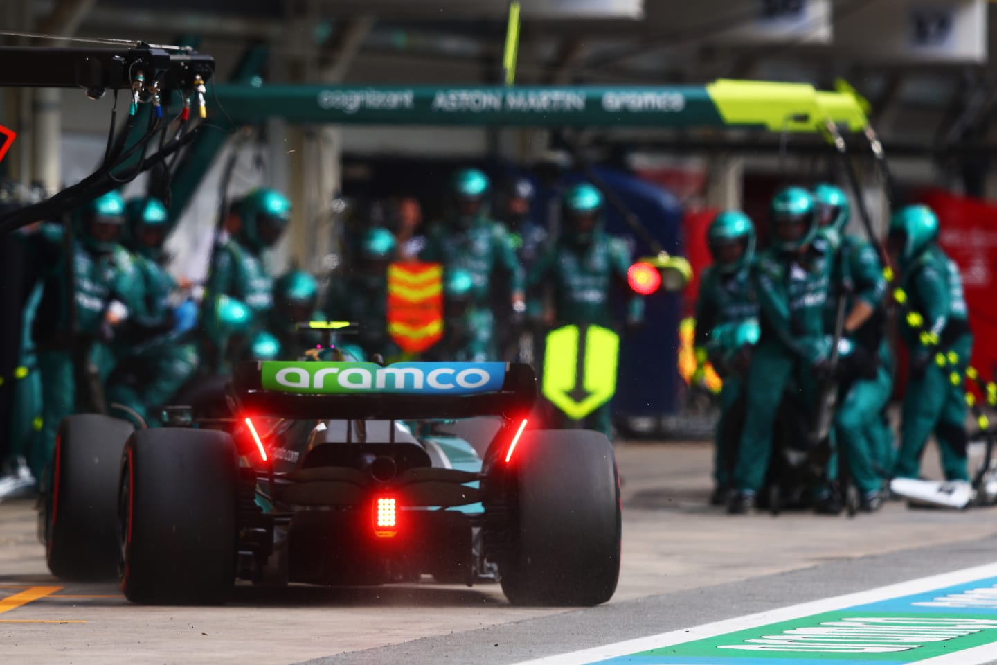 SAO PAULO, BRAZIL - NOVEMBER 13: Sebastian Vettel of Germany driving the (5) Aston Martin AMR22 Mercedes makes a pitstop during the F1 Grand Prix of Brazil at Autodromo Jose Carlos Pace on November 13, 2022 in Sao Paulo, Brazil. (Photo by Mark Thompson/Getty Images)