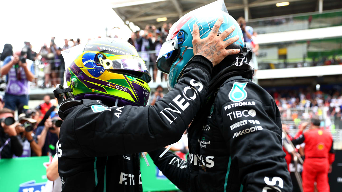 SAO PAULO, BRAZIL - NOVEMBER 13: Race winner George Russell of Great Britain and Mercedes and Second placed Lewis Hamilton of Great Britain and Mercedes celebrates in parc ferme during the F1 Grand Prix of Brazil at Autodromo Jose Carlos Pace on November 13, 2022 in Sao Paulo, Brazil. (Photo by Dan Istitene - Formula 1/Formula 1 via Getty Images)