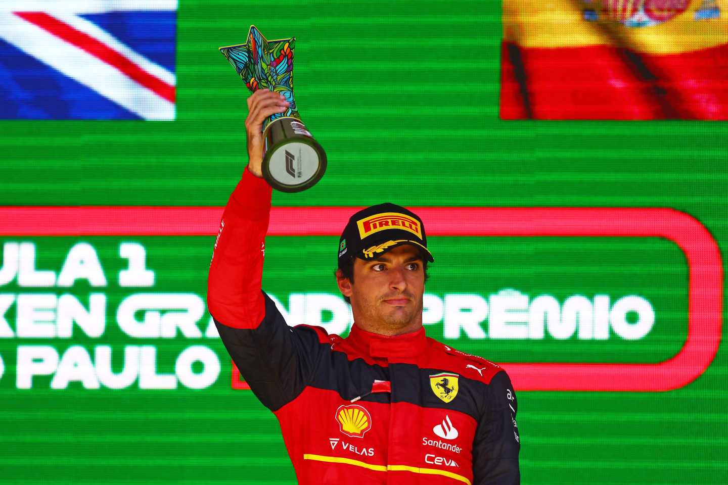 SAO PAULO, BRAZIL - NOVEMBER 13: Third placed Carlos Sainz of Spain and Ferrari celebrates on the podium during the F1 Grand Prix of Brazil at Autodromo Jose Carlos Pace on November 13, 2022 in Sao Paulo, Brazil. (Photo by Mark Thompson/Getty Images)