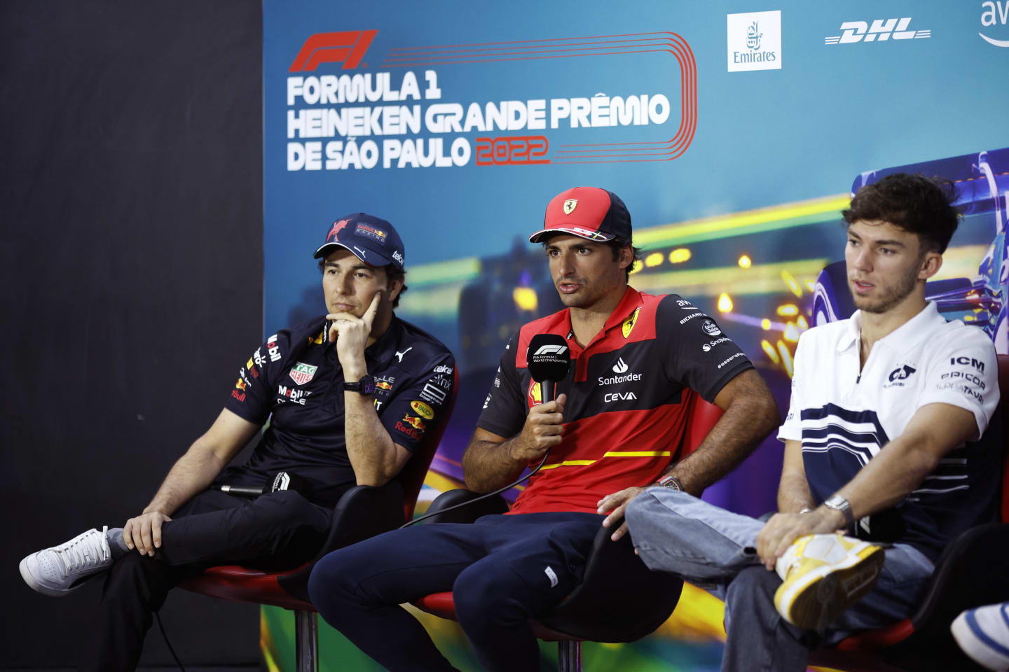 SAO PAULO, BRAZIL - NOVEMBER 10: Sergio Perez of Mexico and Oracle Red Bull Racing, Carlos Sainz of Spain and Ferrari and Pierre Gasly of France and Scuderia AlphaTauri attend the Drivers Press Conference during previews ahead of the F1 Grand Prix of Brazil at Autodromo Jose Carlos Pace on November 10, 2022 in Sao Paulo, Brazil. (Photo by Jared C. Tilton/Getty Images)
