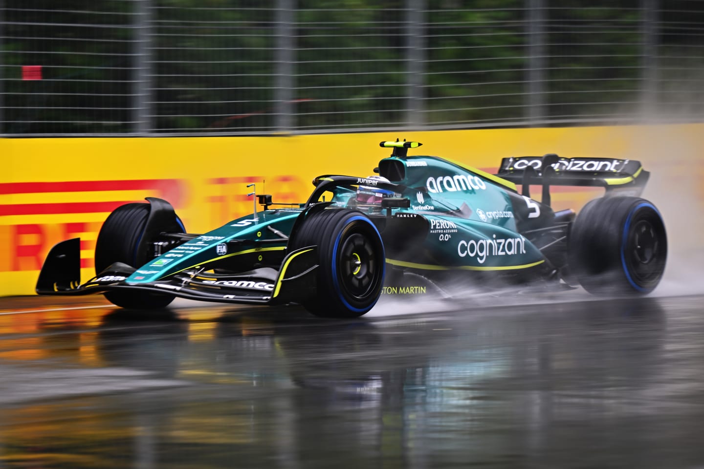 MONTREAL, QUEBEC - JUNE 18: Sebastian Vettel of Germany driving the (5) Aston Martin AMR22 Mercedes in the wet during final practice ahead of the F1 Grand Prix of Canada at Circuit Gilles Villeneuve on June 18, 2022 in Montreal, Quebec. (Photo by Clive Mason/Getty Images)