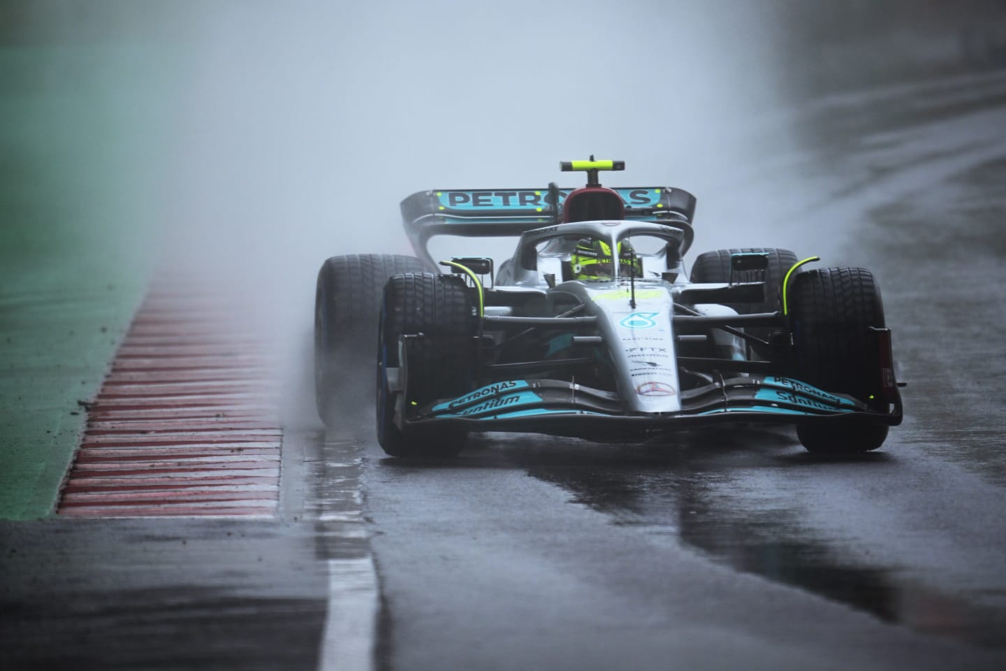 MONTREAL, QUEBEC - JUNE 18: Lewis Hamilton of Great Britain driving the (44) Mercedes AMG Petronas F1 Team W13 in the wet during qualifying ahead of the F1 Grand Prix of Canada at Circuit Gilles Villeneuve on June 18, 2022 in Montreal, Quebec. (Photo by Clive Mason/Getty Images)