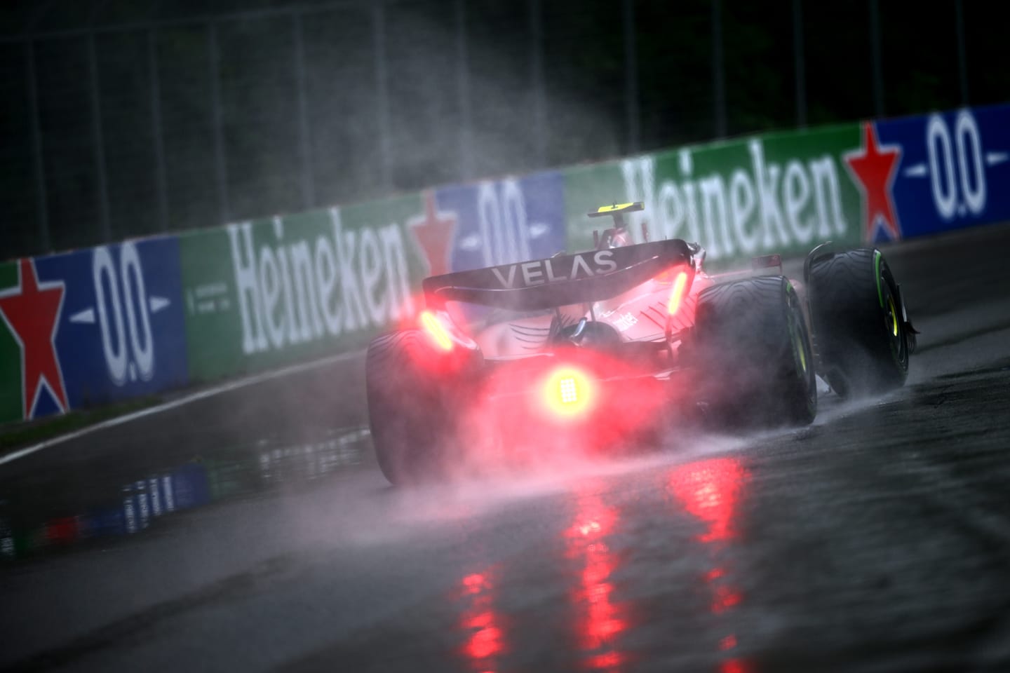 MONTREAL, QUEBEC - JUNE 18: Carlos Sainz of Spain driving (55) the Ferrari F1-75 in the wet during qualifying ahead of the F1 Grand Prix of Canada at Circuit Gilles Villeneuve on June 18, 2022 in Montreal, Quebec. (Photo by Clive Mason/Getty Images)
