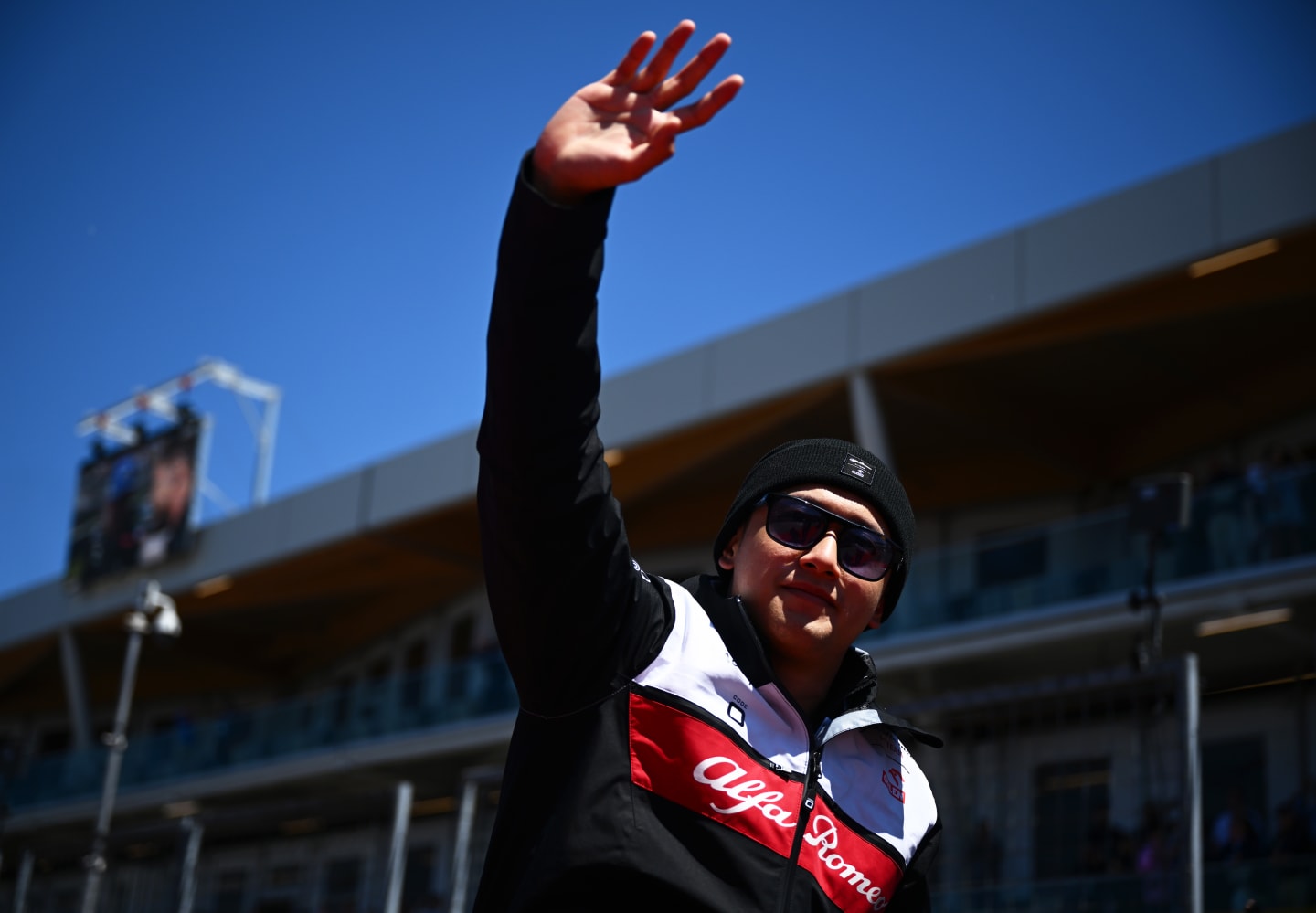 MONTREAL, QUEBEC - JUNE 19: Zhou Guanyu of China and Alfa Romeo F1 waves to the crowd on the