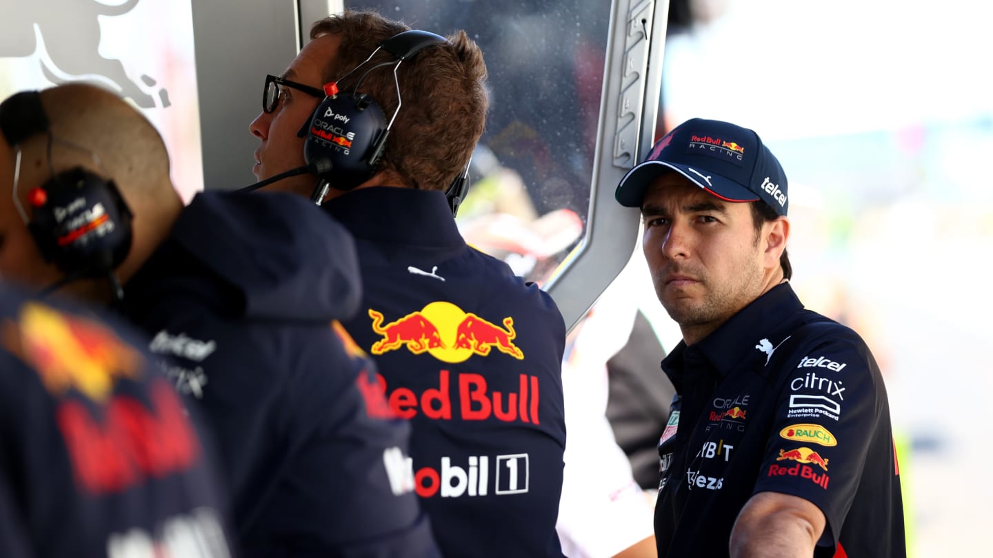 MONTREAL, QUEBEC - JUNE 19: Sergio Perez of Mexico and Oracle Red Bull Racing looks on from the pitwall after retiring from the race during the F1 Grand Prix of Canada at Circuit Gilles Villeneuve on June 19, 2022 in Montreal, Quebec. (Photo by Dan Istitene - Formula 1/Formula 1 via Getty Images)