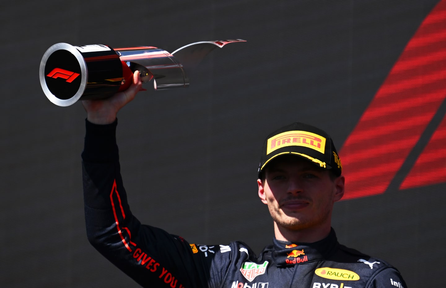 MONTREAL, QUEBEC - JUNE 19: Race winner Max Verstappen of the Netherlands and Oracle Red Bull Racing celebrates on the podium during the F1 Grand Prix of Canada at Circuit Gilles Villeneuve on June 19, 2022 in Montreal, Quebec. (Photo by Clive Mason/Getty Images)