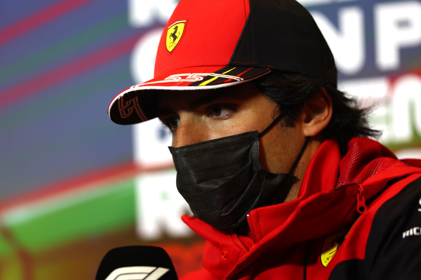 IMOLA, ITALY - APRIL 22: Carlos Sainz of Spain and Ferrari talks in the Drivers Press Conference prior to practice ahead of the F1 Grand Prix of Emilia Romagna at Autodromo Enzo e Dino Ferrari on April 22, 2022 in Imola, Italy. (Photo by Lars Baron/Getty Images)