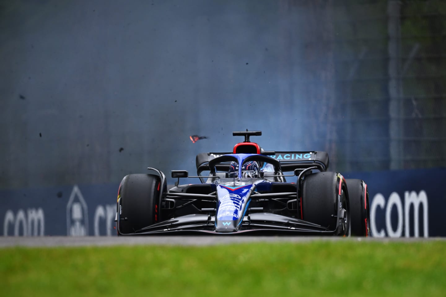 IMOLA, ITALY - APRIL 22: The brakes of Alexander Albon of Thailand driving the (23) Williams FW44 Mercedes explode on track during qualifying ahead of the F1 Grand Prix of Emilia Romagna at Autodromo Enzo e Dino Ferrari on April 22, 2022 in Imola, Italy. (Photo by Clive Mason/Getty Images)