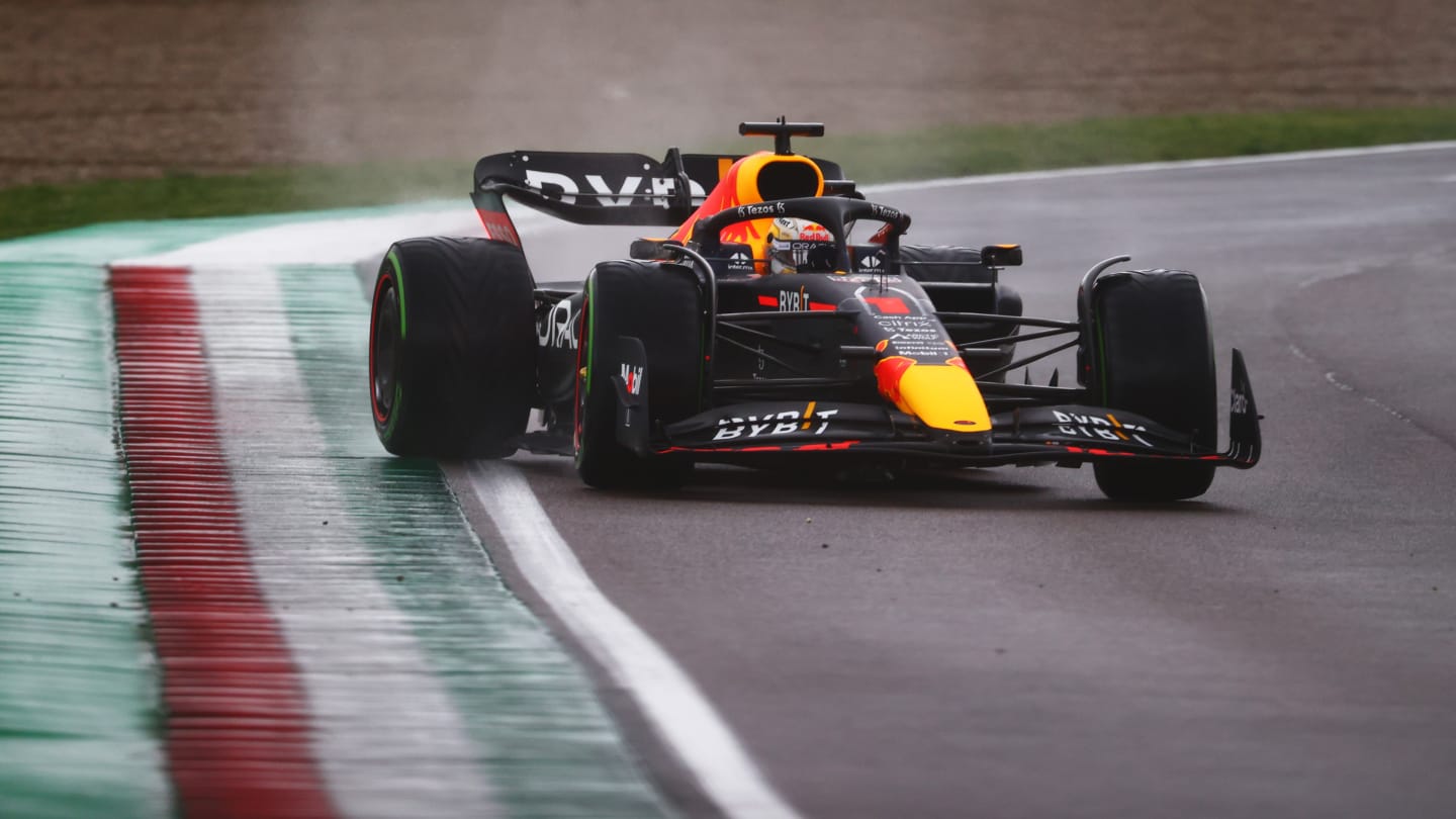 IMOLA, ITALY - APRIL 22: Max Verstappen of the Netherlands driving the (1) Oracle Red Bull Racing RB18 slides round a corner in the wet during qualifying ahead of the F1 Grand Prix of Emilia Romagna at Autodromo Enzo e Dino Ferrari on April 22, 2022 in Imola, Italy. (Photo by Dan Istitene - Formula 1/Formula 1 via Getty Images)