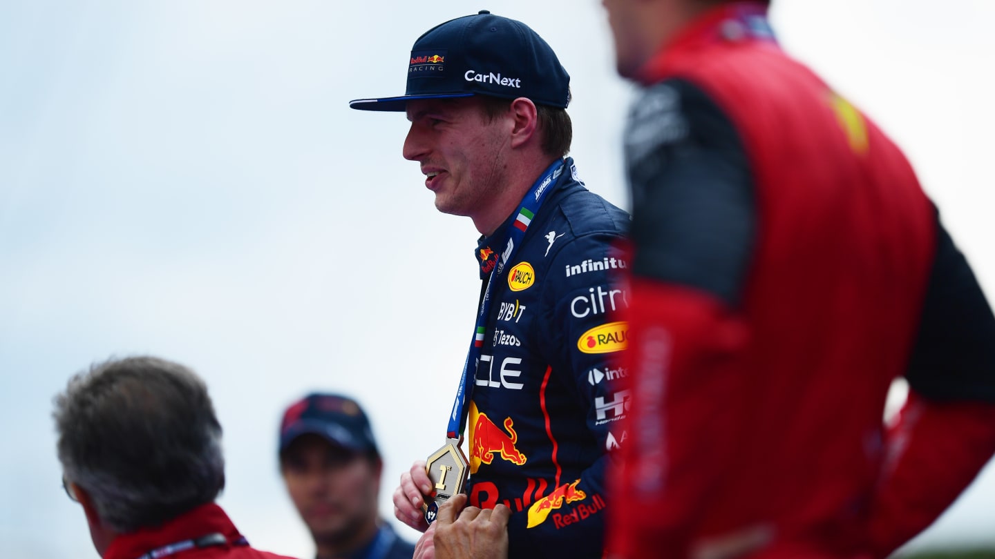 IMOLA, ITALY - APRIL 23: Sprint winner Max Verstappen of the Netherlands and Oracle Red Bull Racing is presented with his medal at the Sprint Victory Ceremony during Sprint ahead of the F1 Grand Prix of Emilia Romagna at Autodromo Enzo e Dino Ferrari on April 23, 2022 in Imola, Italy. (Photo by Mario Renzi - Formula 1/Formula 1 via Getty Images)