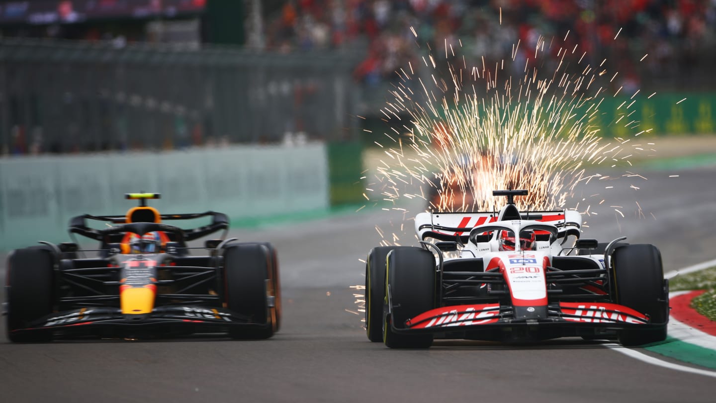 IMOLA, ITALY - APRIL 23: Sparks fly behind Kevin Magnussen of Denmark driving the (20) Haas F1