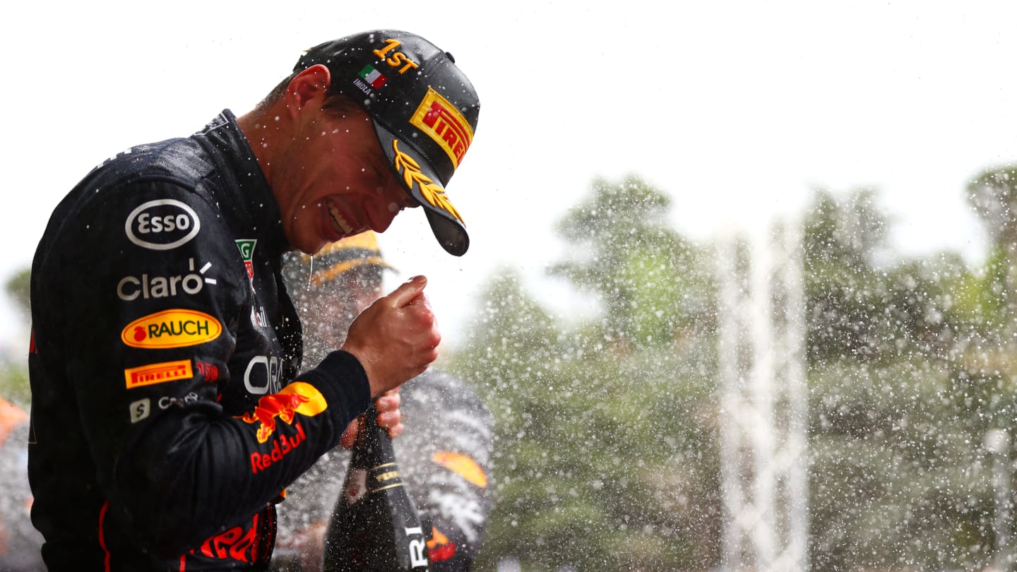 IMOLA, ITALY - APRIL 24: Race winner Max Verstappen of the Netherlands and Oracle Red Bull Racing celebrates on the podium during the F1 Grand Prix of Emilia Romagna at Autodromo Enzo e Dino Ferrari on April 24, 2022 in Imola, Italy. (Photo by Dan Istitene - Formula 1/Formula 1 via Getty Images)