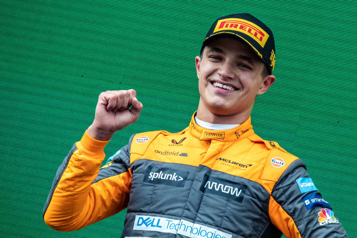 Lando Norris celebrates on the podium at Imola in 2022