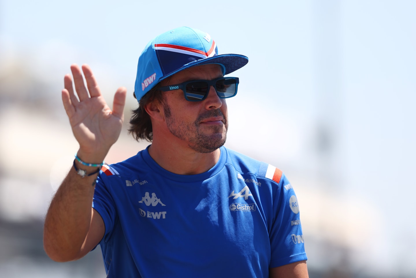 LE CASTELLET, FRANCE - JULY 24: Fernando Alonso of Spain and Alpine F1 waves to the crowd on the drivers parade ahead of the F1 Grand Prix of France at Circuit Paul Ricard on July 24, 2022 in Le Castellet, France. (Photo by Clive Rose/Getty Images)