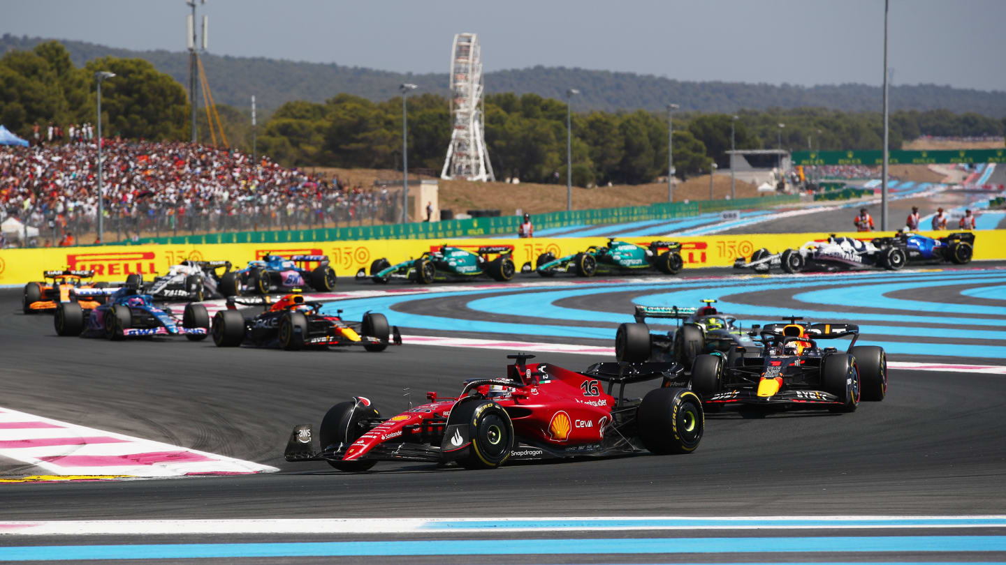 LE CASTELLET, FRANCE - JULY 24: Charles Leclerc of Monaco driving the (16) Ferrari F1-75 leads Max