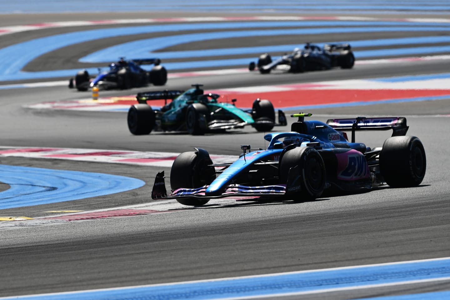 LE CASTELLET, FRANCE - JULY 24: Esteban Ocon of France driving the (31) Alpine F1 A522 Renault leads Lance Stroll of Canada driving the (18) Aston Martin AMR22 Mercedes during the F1 Grand Prix of France at Circuit Paul Ricard on July 24, 2022 in Le Castellet, France. (Photo by Dan Mullan/Getty Images)