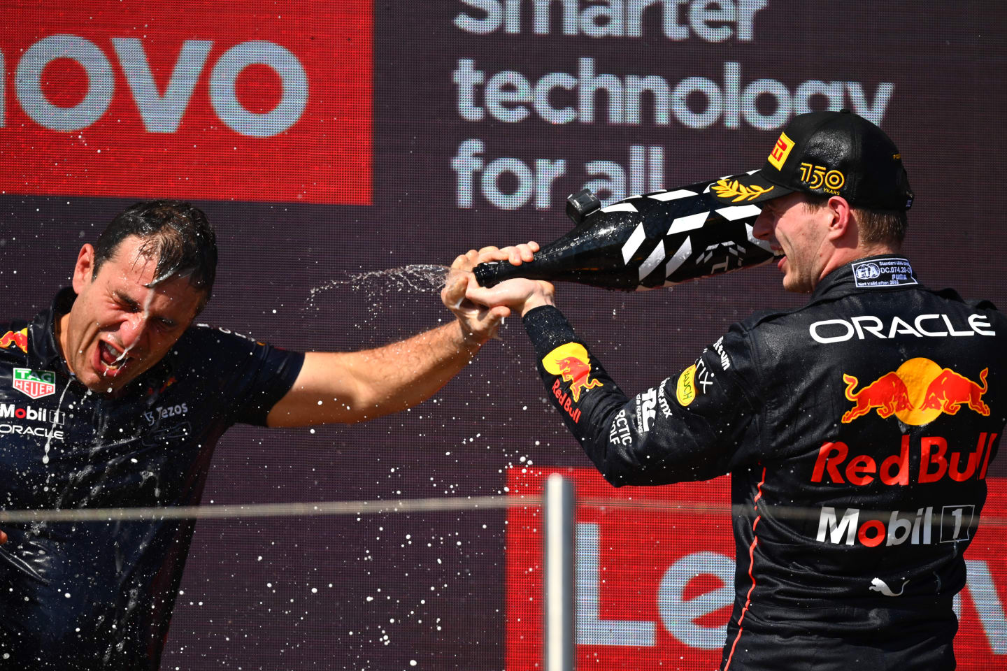 LE CASTELLET, FRANCE - JULY 24: Race winner Max Verstappen of the Netherlands and Oracle Red Bull Racing and Pierre Wache, Chief Engineer of Performance Engineering at Red Bull Racing celebrate on the podium during the F1 Grand Prix of France at Circuit Paul Ricard on July 24, 2022 in Le Castellet, France. (Photo by Dan Mullan/Getty Images)