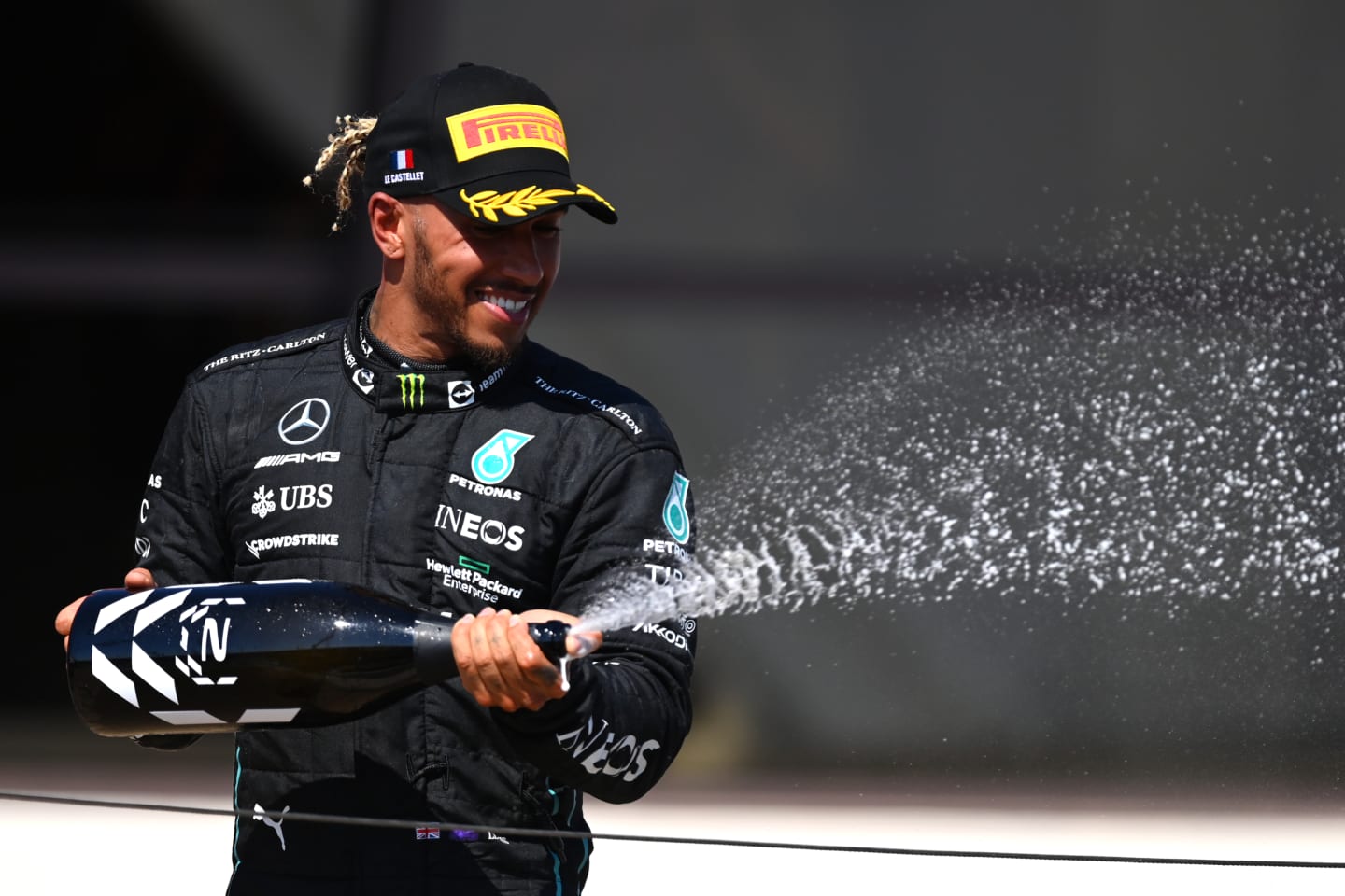 LE CASTELLET, FRANCE - JULY 24: Second placed Lewis Hamilton of Great Britain and Mercedes celebrates on the podium during the F1 Grand Prix of France at Circuit Paul Ricard on July 24, 2022 in Le Castellet, France. (Photo by Dan Mullan/Getty Images)