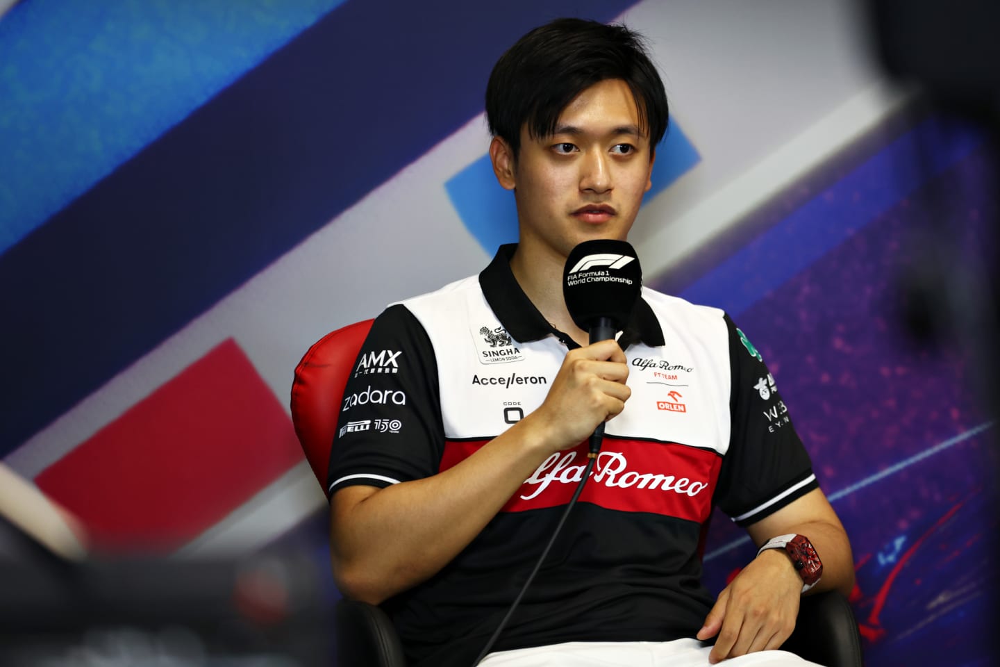 LE CASTELLET, FRANCE - JULY 21: Zhou Guanyu of China and Alfa Romeo F1 talks in the Drivers Press Conference during previews ahead of the F1 Grand Prix of France at Circuit Paul Ricard on July 21, 2022 in Le Castellet, France. (Photo by Bryn Lennon/Getty Images)