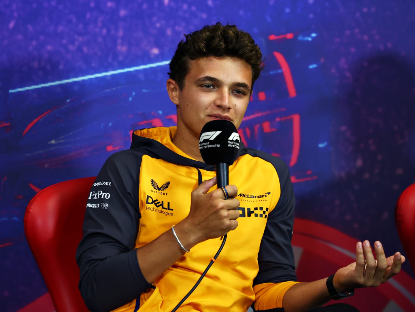 LE CASTELLET, FRANCE - JULY 21: Lando Norris of Great Britain and McLaren talks in the Drivers Press Conference during previews ahead of the F1 Grand Prix of France at Circuit Paul Ricard on July 21, 2022 in Le Castellet, France. (Photo by Bryn Lennon/Getty Images)