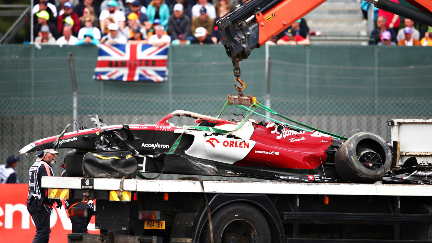 NORTHAMPTON, ENGLAND - JULY 03: The car of Zhou Guanyu of China and Alfa Romeo F1 is recovered from