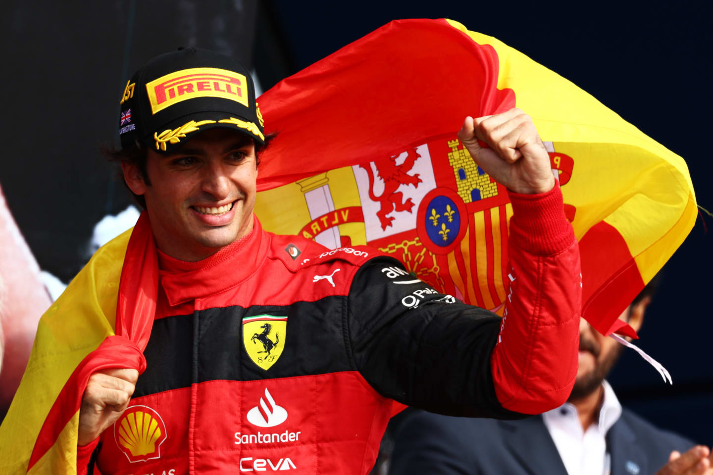 NORTHAMPTON, ENGLAND - JULY 03: Race winner Carlos Sainz of Spain and Ferrari celebrates on the podium during the F1 Grand Prix of Great Britain at Silverstone on July 03, 2022 in Northampton, England. (Photo by Clive Rose/Getty Images)