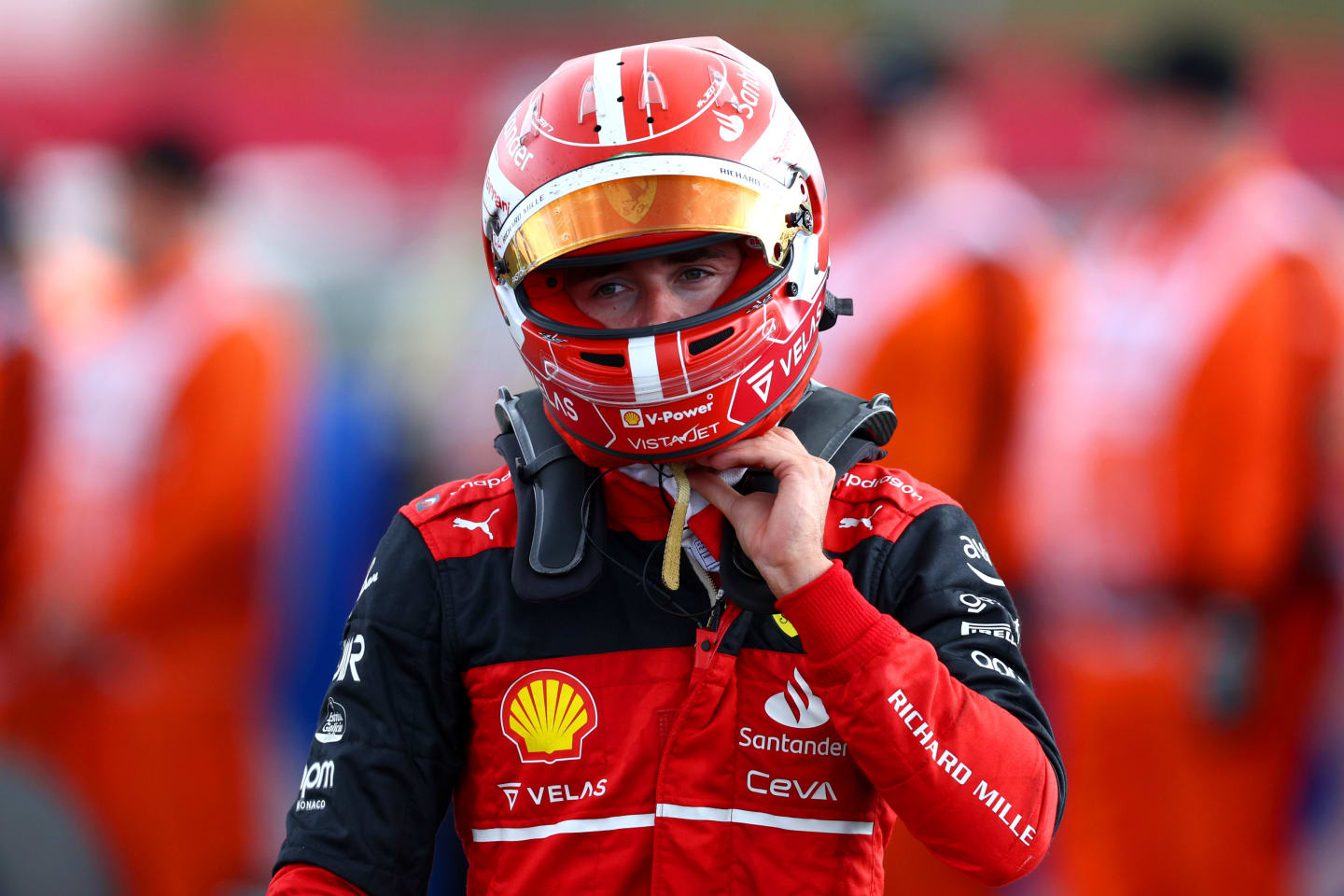 NORTHAMPTON, ENGLAND - JULY 03: Charles Leclerc of Monaco and Ferrari looks on in parc ferme during