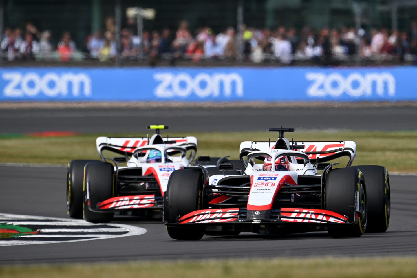 NORTHAMPTON, ENGLAND - JULY 03: Kevin Magnussen of Denmark driving the (20) Haas F1 VF-22 Ferrari leads Mick Schumacher of Germany driving the (47) Haas F1 VF-22 Ferrari on track during the F1 Grand Prix of Great Britain at Silverstone on July 03, 2022 in Northampton, England. (Photo by Clive Mason/Getty Images)