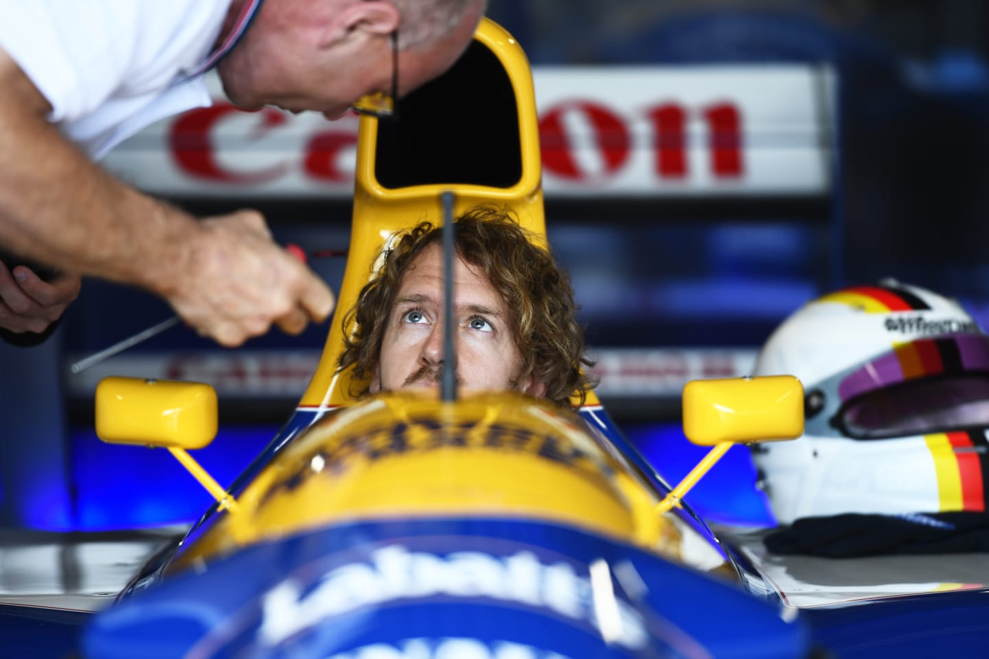 NORTHAMPTON, ENGLAND - JUNE 30: Sebastian Vettel of Germany and Aston Martin F1 Team looks on as he