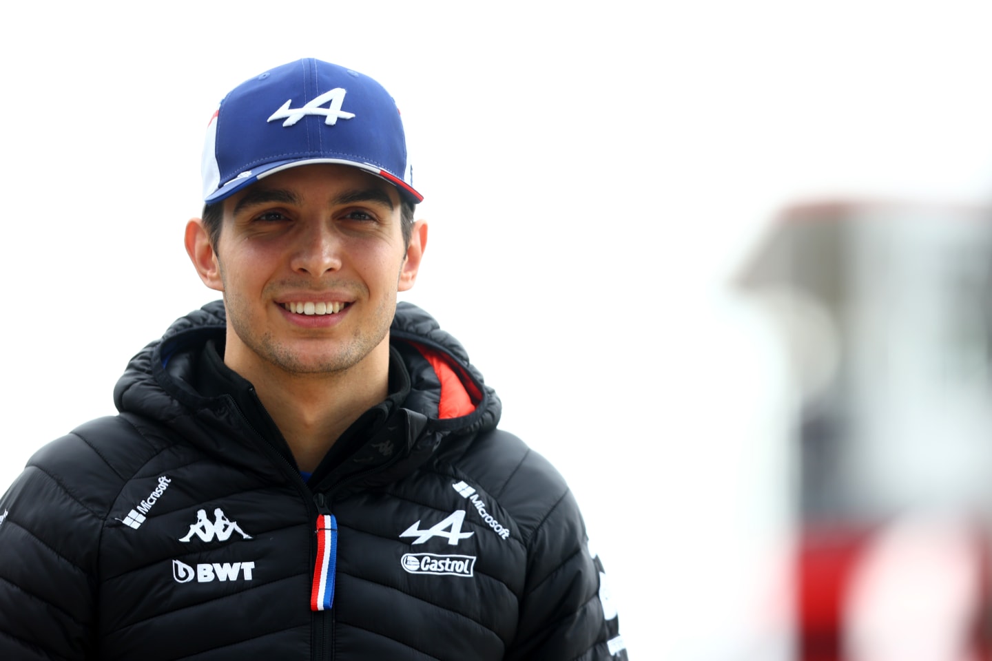 NORTHAMPTON, ENGLAND - JUNE 30: Esteban Ocon of France and Alpine F1 walks in the Paddock during