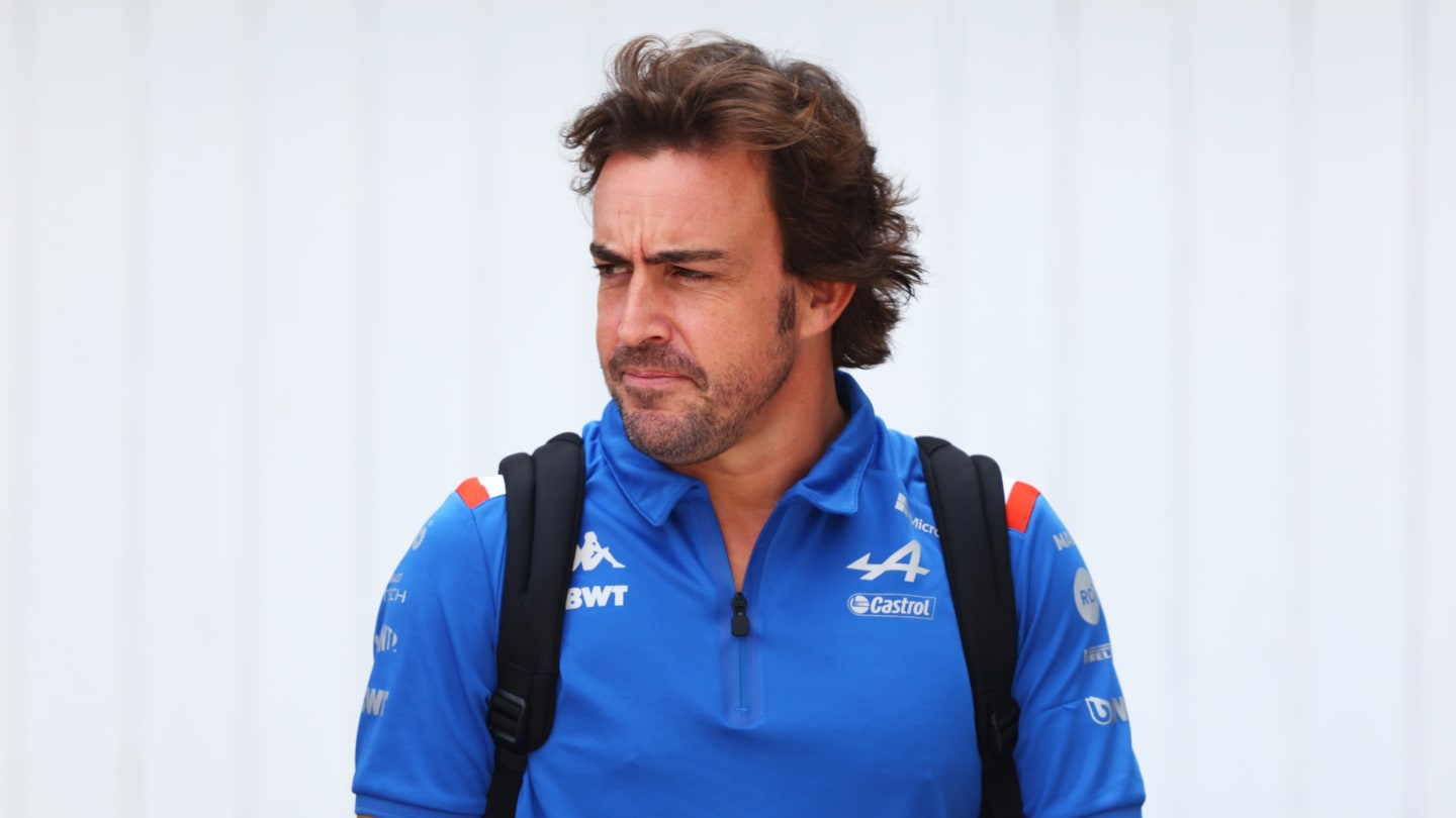 BUDAPEST, HUNGARY - JULY 29: Fernando Alonso of Spain and Alpine F1 looks on in the Paddock prior to practice ahead of the F1 Grand Prix of Hungary at Hungaroring on July 29, 2022 in Budapest, Hungary. (Photo by Bryn Lennon - Formula 1/Formula 1 via Getty Images)