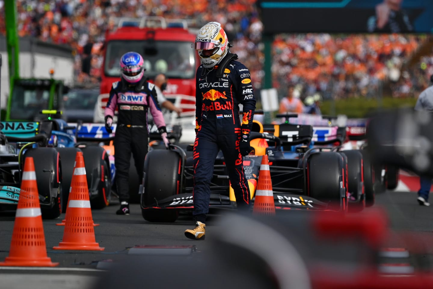 BUDAPEST, HUNGARY - JULY 30: Tenth place qualifier Max Verstappen of the Netherlands and Oracle Red Bull Racing walks in parc ferme during qualifying ahead of the F1 Grand Prix of Hungary at Hungaroring on July 30, 2022 in Budapest, Hungary. (Photo by Dan Mullan/Getty Images)