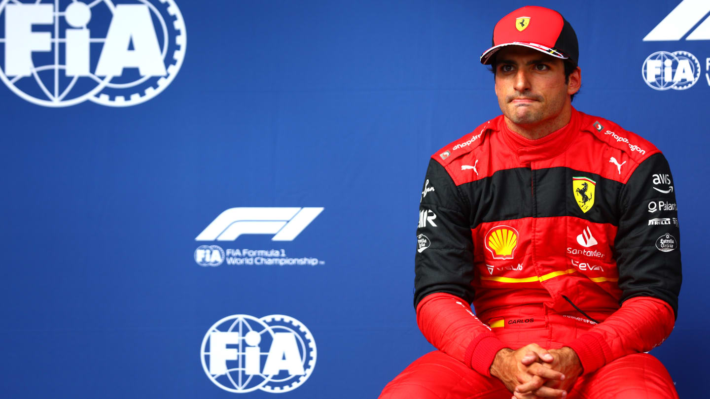 BUDAPEST, HUNGARY - JULY 30: Second placed qualifier Carlos Sainz of Spain and Ferrari looks dejected in parc ferme during qualifying ahead of the F1 Grand Prix of Hungary at Hungaroring on July 30, 2022 in Budapest, Hungary. (Photo by Dan Istitene - Formula 1/Formula 1 via Getty Images)