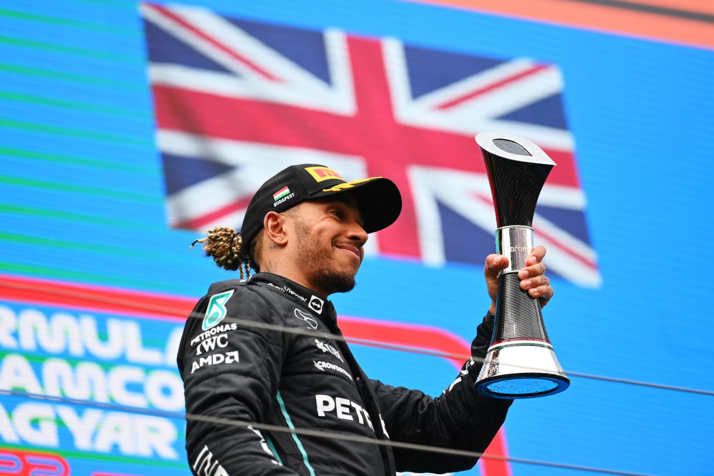 BUDAPEST, HUNGARY - JULY 31: Second placed Lewis Hamilton of Great Britain and Mercedes celebrates
