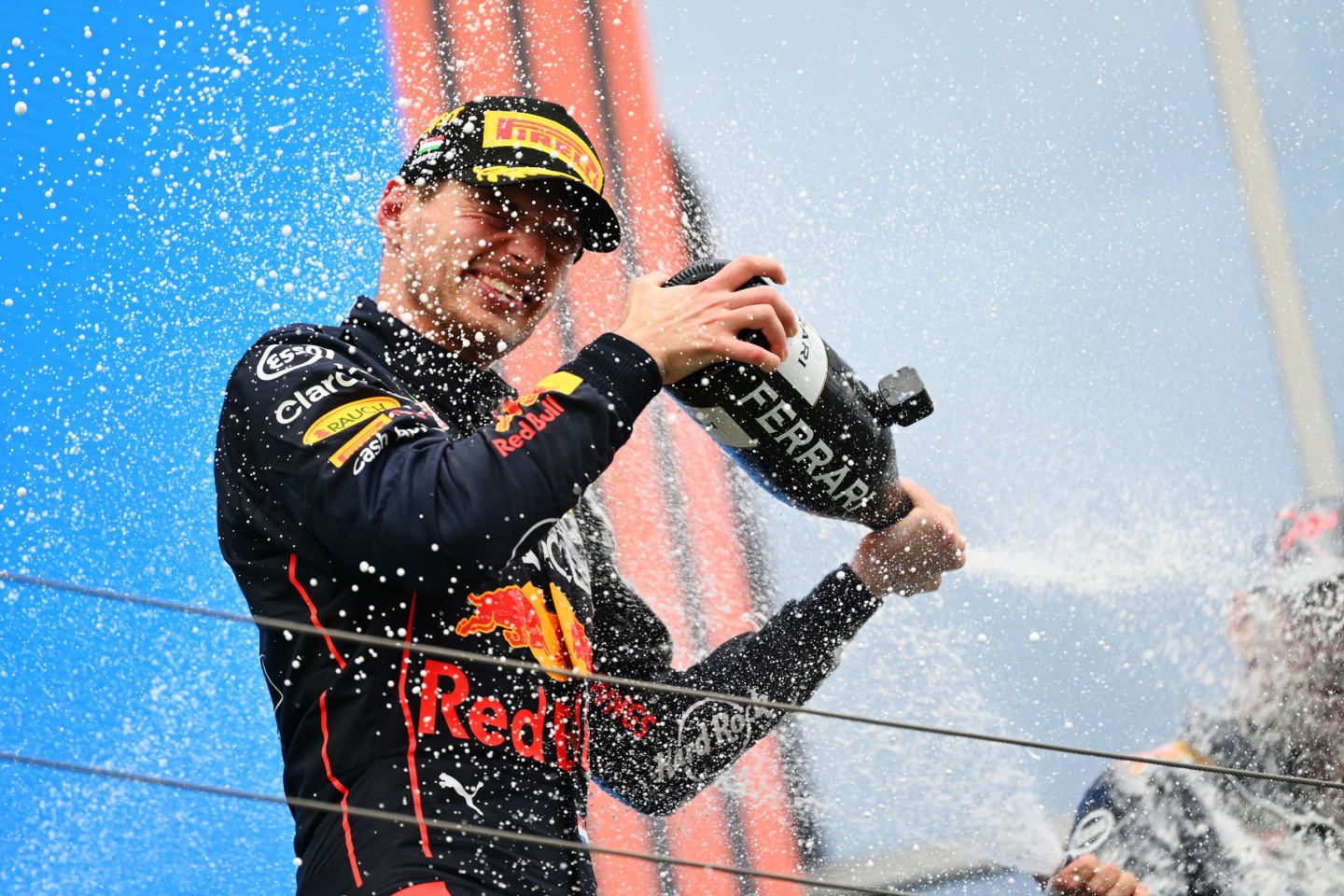 BUDAPEST, HUNGARY - JULY 31: Race winner Max Verstappen of the Netherlands and Oracle Red Bull Racing celebrates on the podium during the F1 Grand Prix of Hungary at Hungaroring on July 31, 2022 in Budapest, Hungary. (Photo by Dan Mullan/Getty Images)