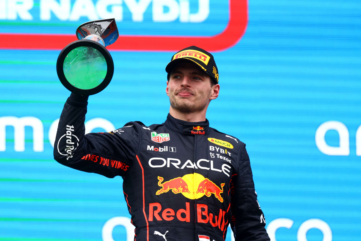 BUDAPEST, HUNGARY - JULY 31: Race winner Max Verstappen of the Netherlands and Oracle Red Bull Racing celebrates on the podium during the F1 Grand Prix of Hungary at Hungaroring on July 31, 2022 in Budapest, Hungary. (Photo by Francois Nel/Getty Images)