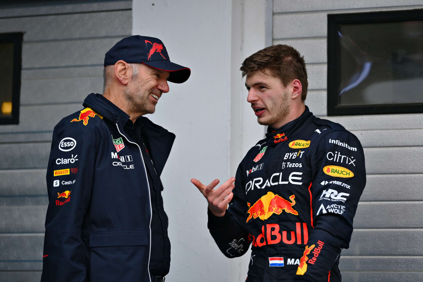 BUDAPEST, HUNGARY - JULY 31: Race winner Max Verstappen of the Netherlands and Oracle Red Bull Racing talks with Adrian Newey, the Chief Technical Officer of Red Bull Racing in parc ferme during the F1 Grand Prix of Hungary at Hungaroring on July 31, 2022 in Budapest, Hungary. (Photo by Dan Mullan/Getty Images)