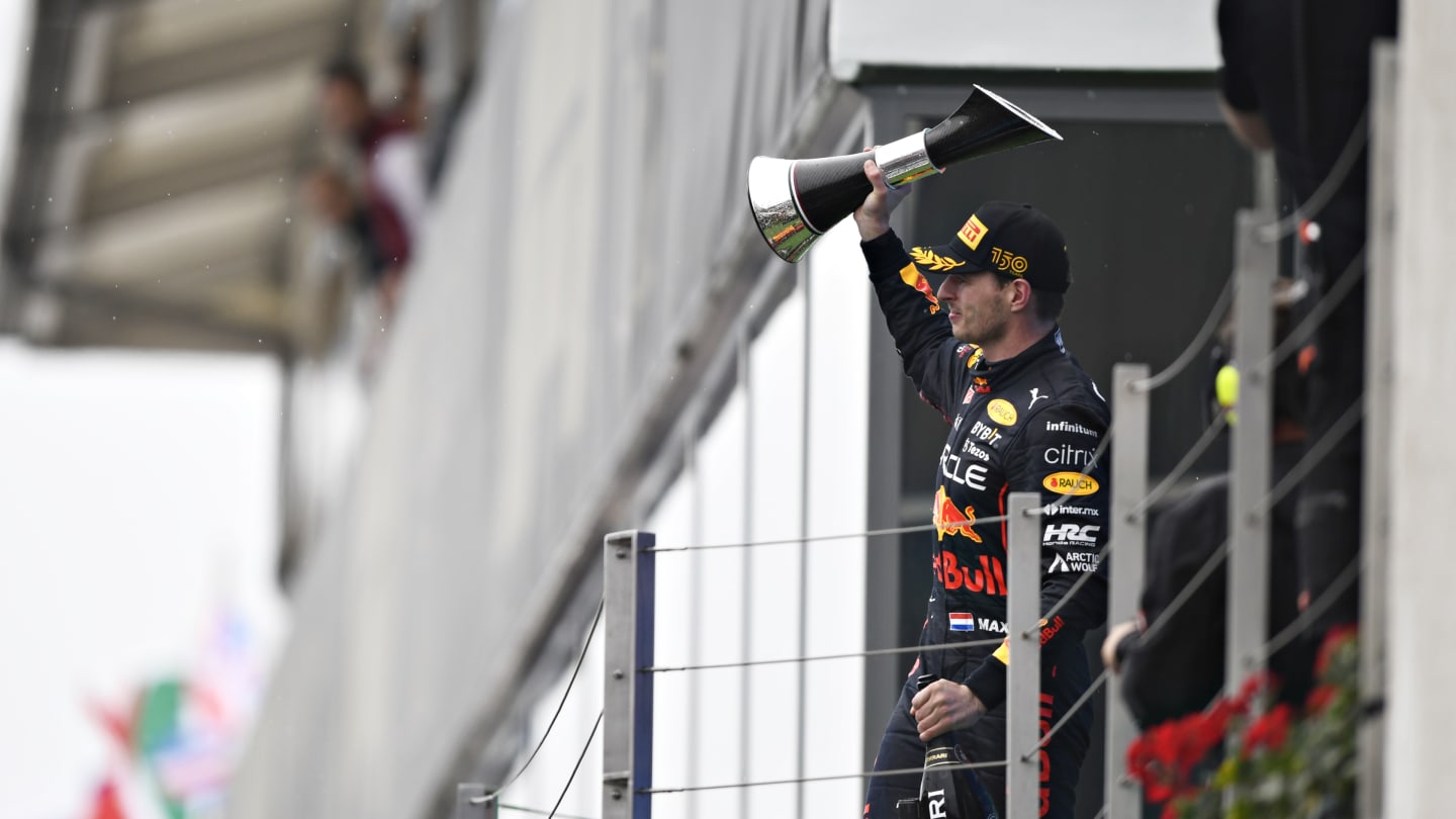 BUDAPEST, HUNGARY - JULY 31: Race winner Max Verstappen of the Netherlands and Oracle Red Bull Racing celebrates on the podium during the F1 Grand Prix of Hungary at Hungaroring on July 31, 2022 in Budapest, Hungary. (Photo by Rudy Carezzevoli - Formula 1/Formula 1 via Getty Images)